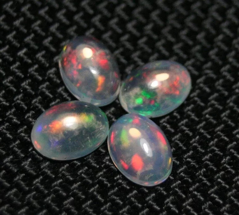 Welo Opal Cabochon Rainbow Flash 7x5mm 4pc Lot 2.1ct Natural Opal Ethiopia