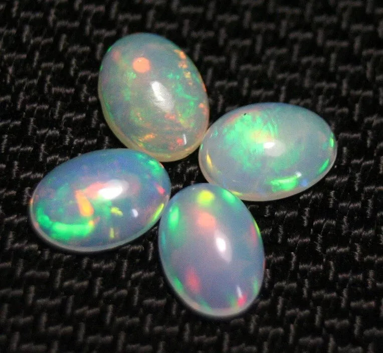 Welo Opal Cabochon Rainbow Flash 7x5mm 4pc Lot 1.76ct Natural Opal Ethiopia