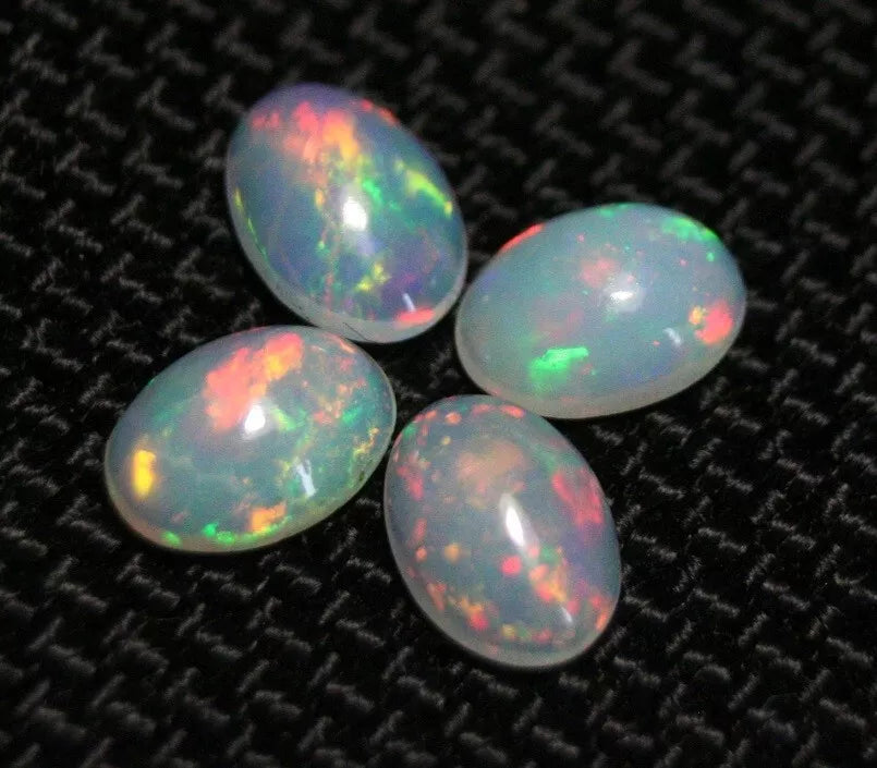 Welo Opal Cabochon Rainbow Flash 7x5mm 4pc Lot 1.72ct Natural Opal Ethiopia