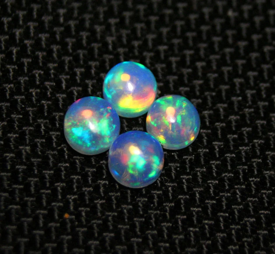 Welo Crystal Opal Round 5x5mm Rainbow Cabochons 4pc Lot 1.78ct AAA Jelly Opal