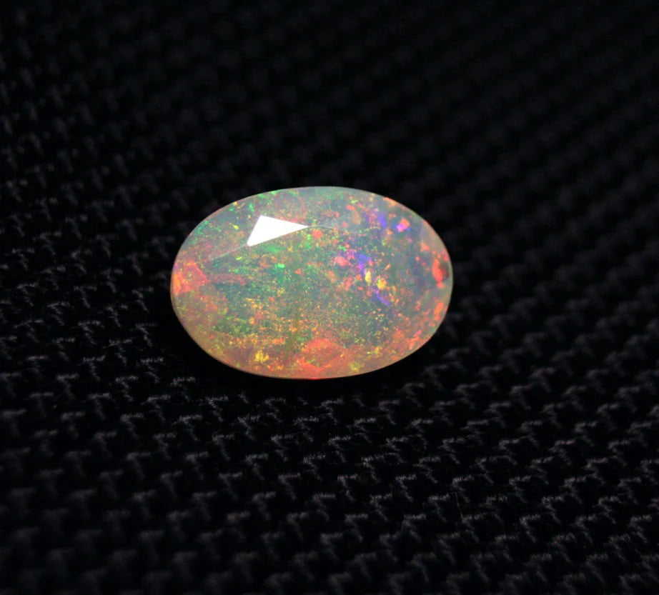 Faceted Welo Opal 2.2ct Rainbow Confetti Blaze Natural Ethiopian Opal 12x8mm Video AAA