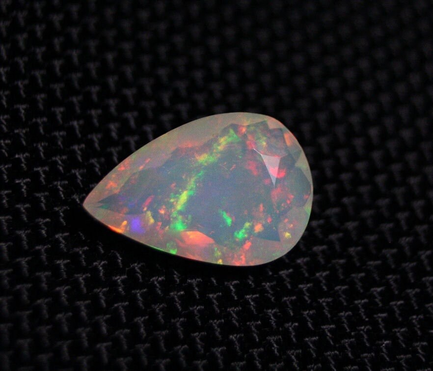 Faceted Welo Opal 3ct Rainbow Blaze Natural Ethiopian Opal 15x10mm Video AAA