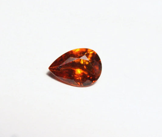 Clinohumite 0.7ct Ultra Rare Orange / Red Faceted Gem Pakistan 7x5mm