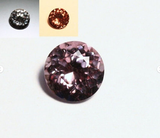 Colour Change Garnet 1.17ct Round Cut Rare Scintillating Gem Tanzania 6x6mm AAA