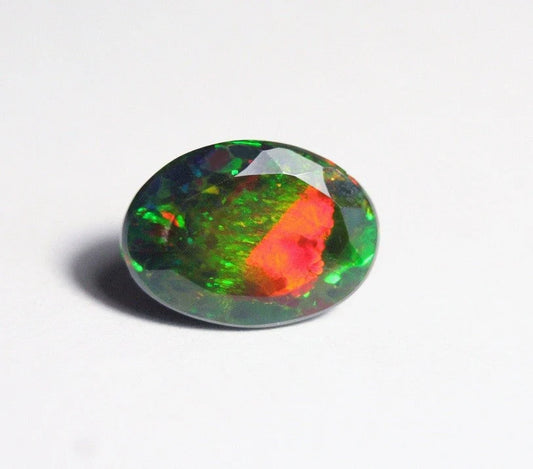 Faceted Black Welo Opal 5.24ct Rainbow Confetti AAA Natural Ethiopian Opal 13x9mm