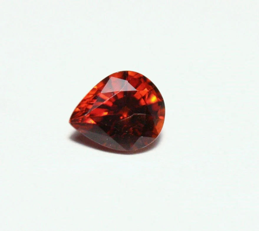 Clinohumite 0.66ct Ultra Rare Orange / Red Faceted Gem - Pakistan 6x5mm