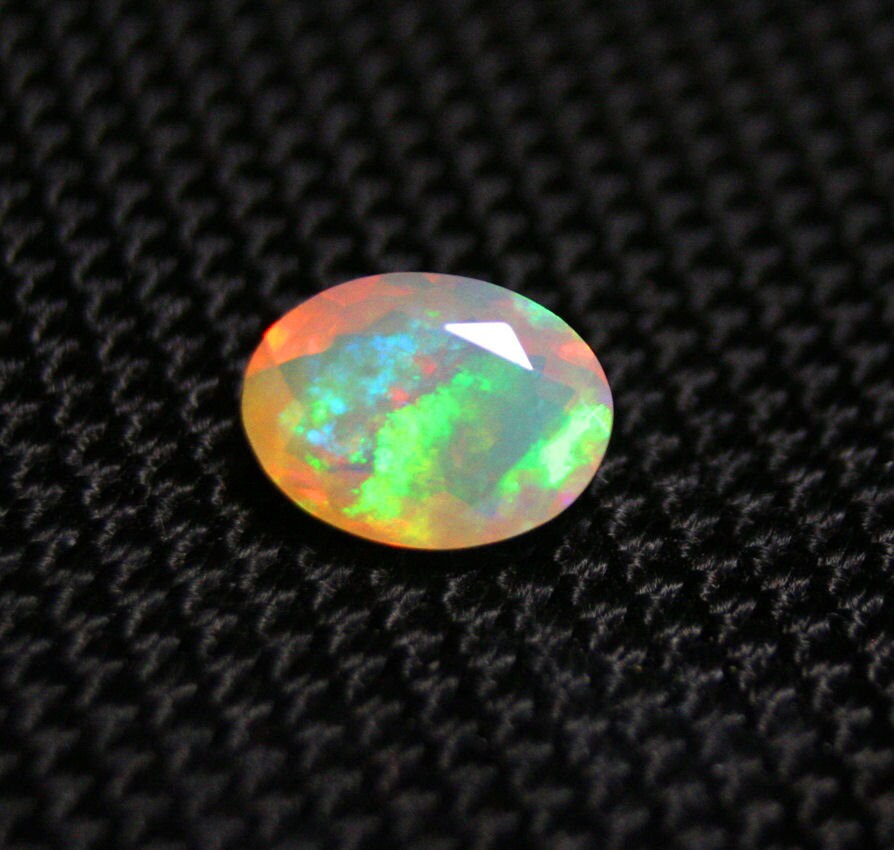 Faceted Welo Opal 1.27ct Rainbow Neon Haze Natural Ethiopian Opal 9x7mm Video AAA