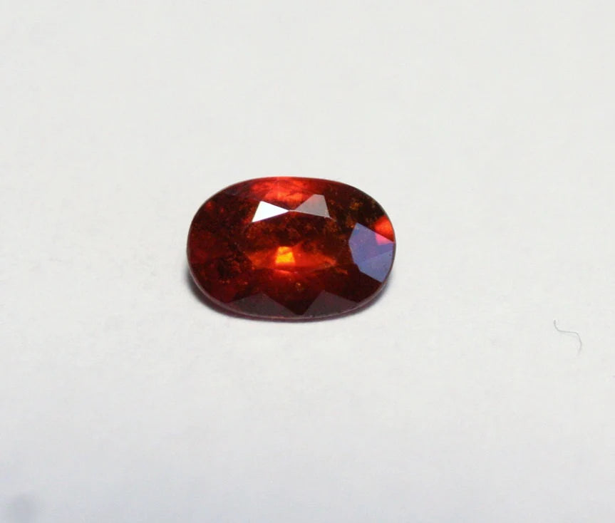 Clinohumite 0.56ct Ultra Rare Deep Orange / Red Faceted Gem - Pakistan 6x4mm