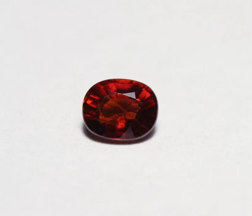 Clinohumite 0.63ct Ultra Rare Deep Orange Faceted Gem Pakistan 5x4mm