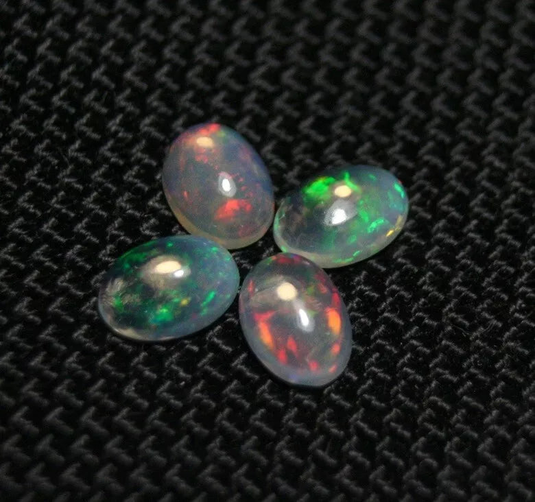 Welo Opal Cabochon Rainbow Flash 7x5mm 4pc Lot 2.27ct Natural Opal Ethiopia