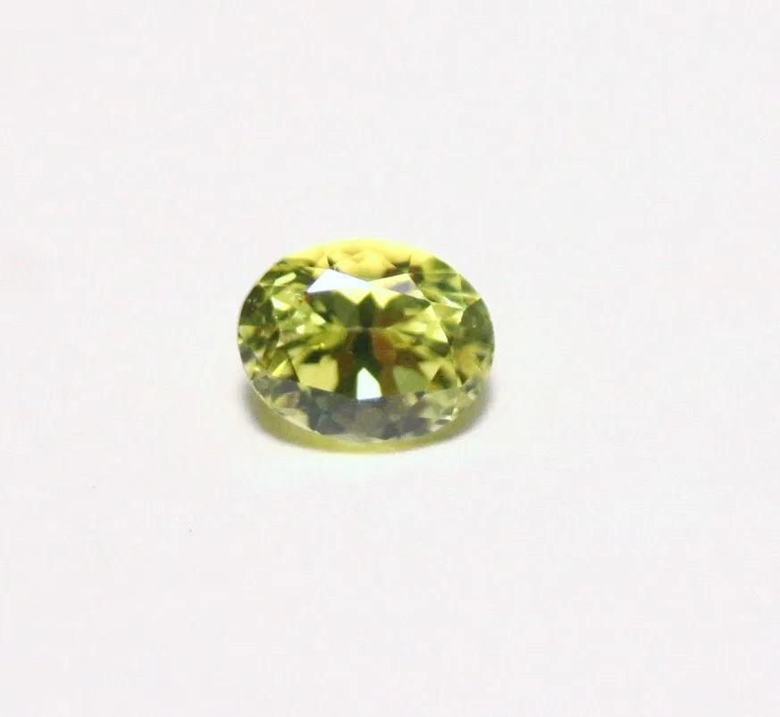 Burmese Chrysoberyl 0.69ct Rare Neon Yellow AAA Scintillating Oval Cut 5.5x4mm