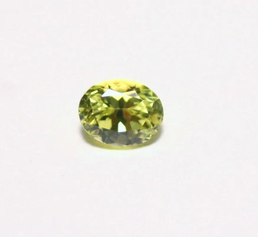 Burmese Chrysoberyl 0.69ct Rare Neon Yellow AAA Scintillating Oval Cut 5.5x4mm