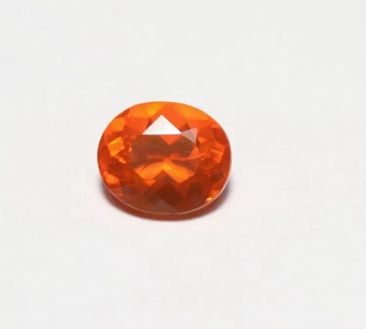 Faceted Orange Mexican Fire Opal 0.7ct Oval Cut Natural Opalescent 7x5mm