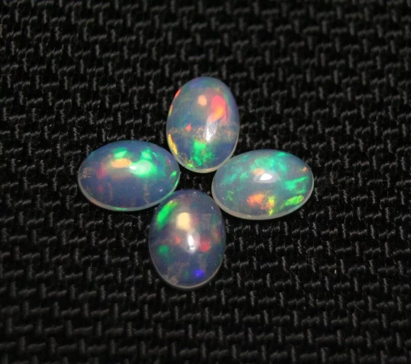 Welo Opal Cabochon Rainbow Flash 7x5mm 4pc Lot 1.49ct Natural Opal Ethiopia