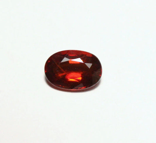 Clinohumite 0.71ct Ultra Rare Deep Orange / Red Faceted Gem - Pakistan 7x4mm