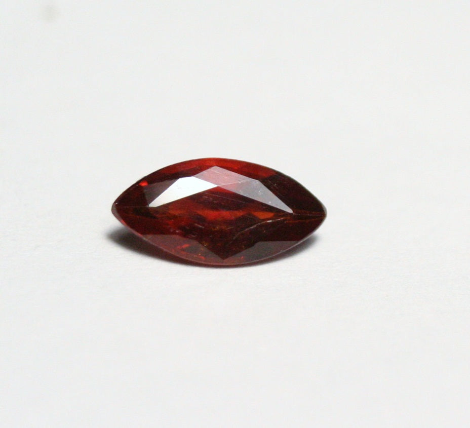 Clinohumite 0.73ct Ultra Rare Deep Orange / Red Faceted Gem - Pakistan 8x4mm