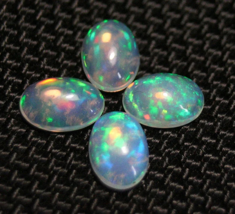 Welo Opal Cabochon 7x5mm 4pc Lot 1.74ct Lot Rainbow Ovals AAA Crystal Opal