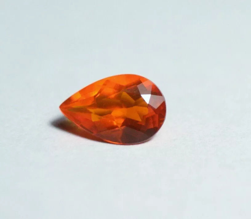 Faceted Orange Mexican Fire Opal 0.65ct Pear Cut Natural Opalescent 8x5mm