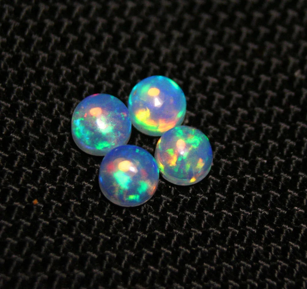 Welo Crystal Opal Round 5x5mm Rainbow Cabochons 4pc Lot 1.78ct AAA Jelly Opal