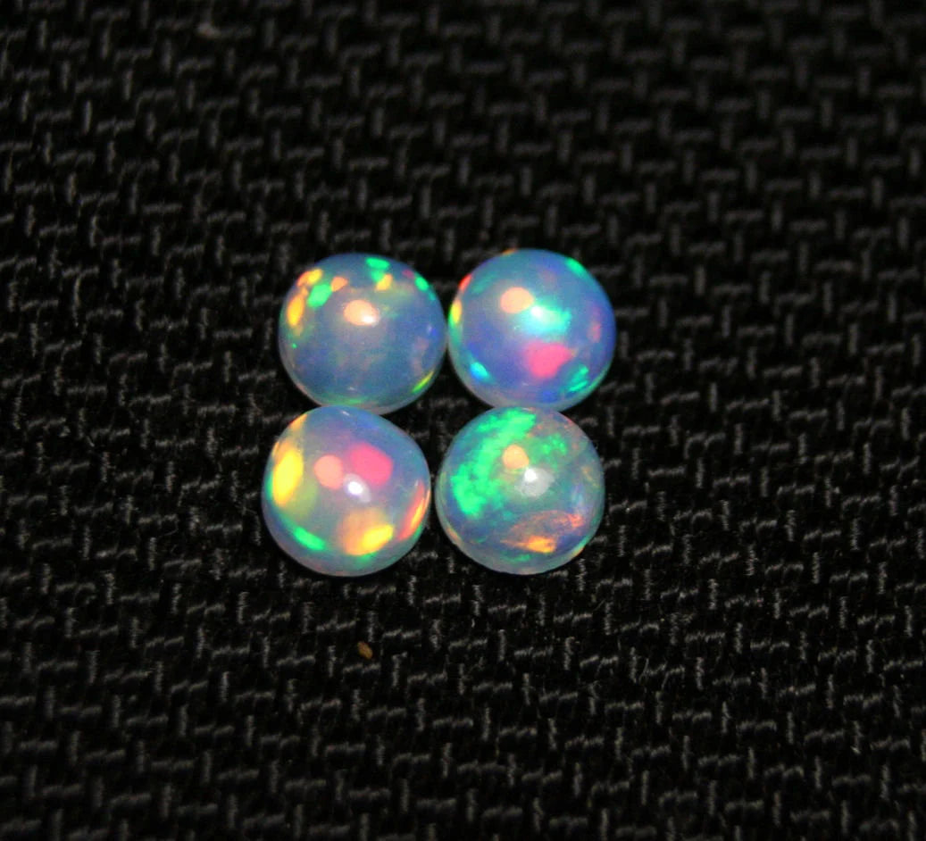 Welo Crystal Opal Round 5x5mm Rainbow Cabochons 4pc Lot 1.35ct AAA Jelly Opal