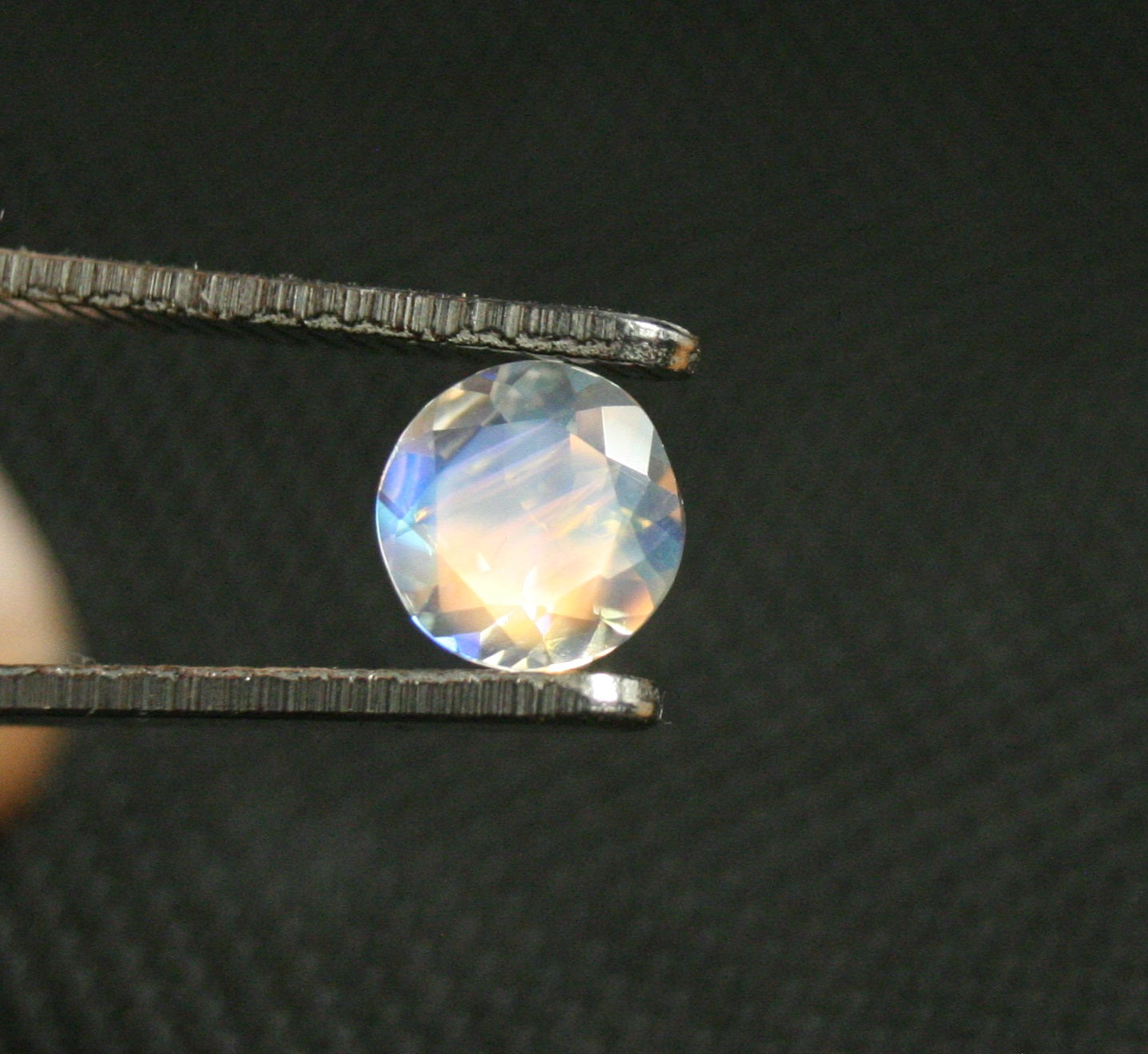 Faceted Moonstone 0.9ct Madagascar AAA Rainbow Moonstone 7x6.5mm