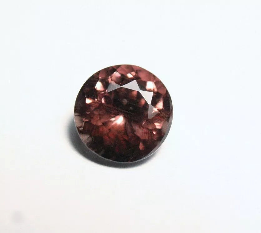 Colour Change Garnet 1.69ct Round Cut Gem with Rare Colour Change Tanzania 6x6mm