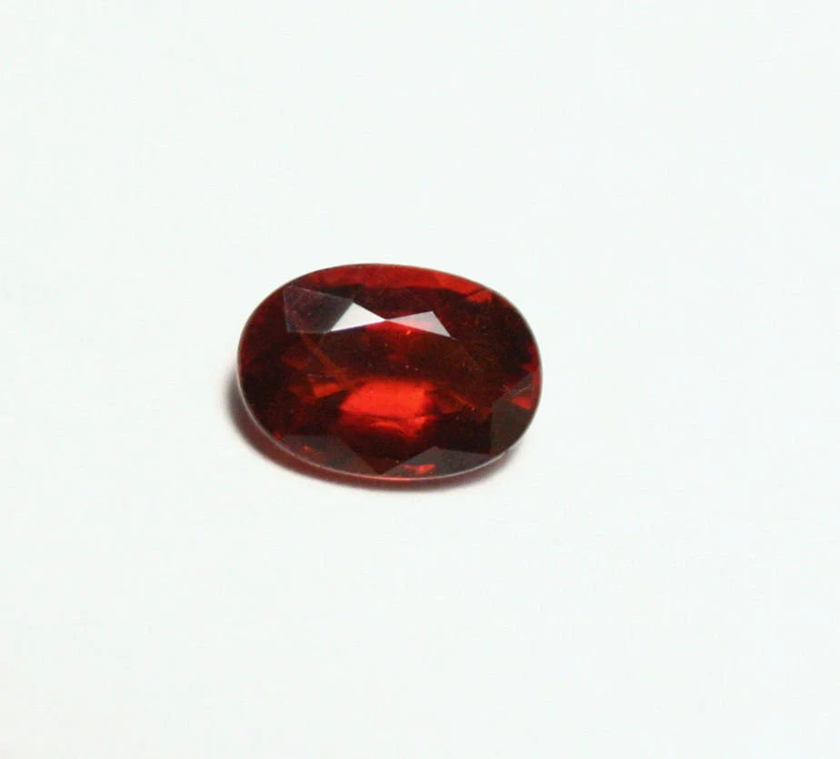 Clinohumite 0.71ct Ultra Rare Deep Orange / Red Faceted Gem - Pakistan 7x4mm