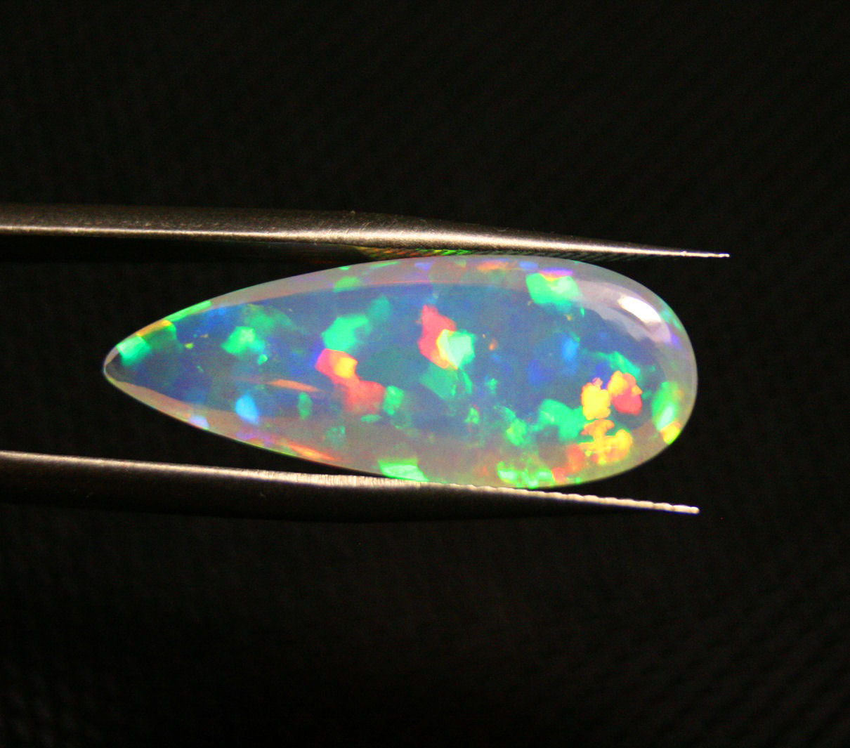 Welo Opal Cabochon 7.5ct Harlequin Puzzle Pear Natural Crystal Opal Video AAA