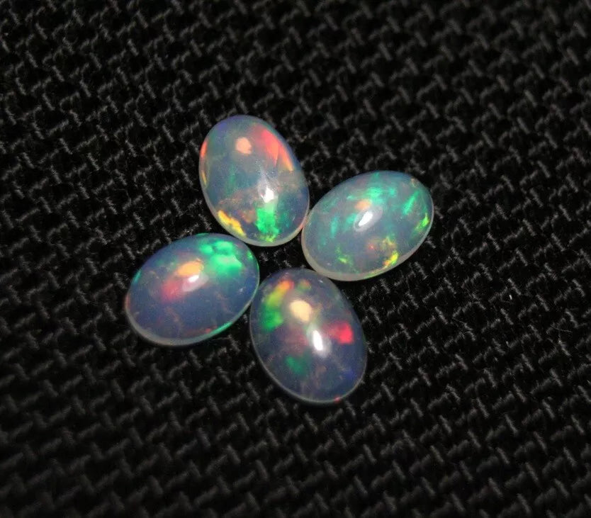 Welo Opal Cabochon Rainbow Flash 7x5mm 4pc Lot 1.49ct Natural Opal Ethiopia