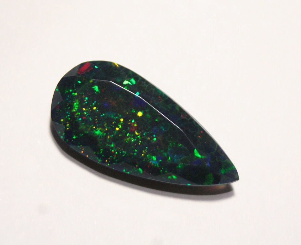 Faceted Black Welo Opal 6.1ct Honeycomb Confetti AAA Ethiopian Opal 22x11mm