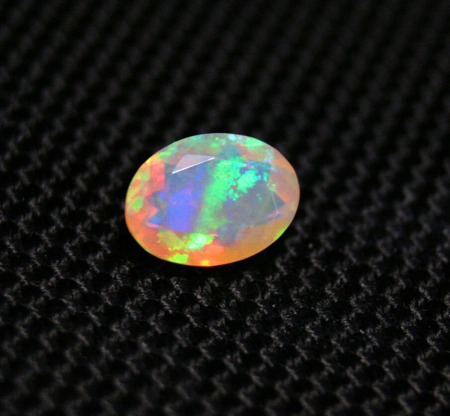 Faceted Welo Opal 1.27ct Rainbow Neon Haze Natural Ethiopian Opal 9x7mm Video AAA