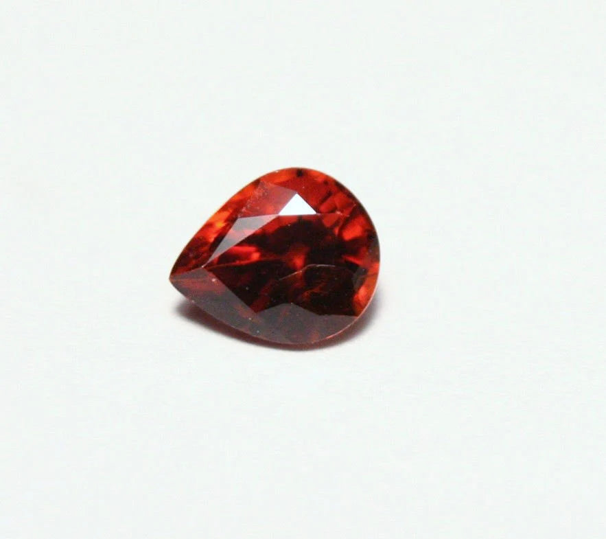 Clinohumite 0.66ct Ultra Rare Orange / Red Faceted Gem - Pakistan 6x5mm