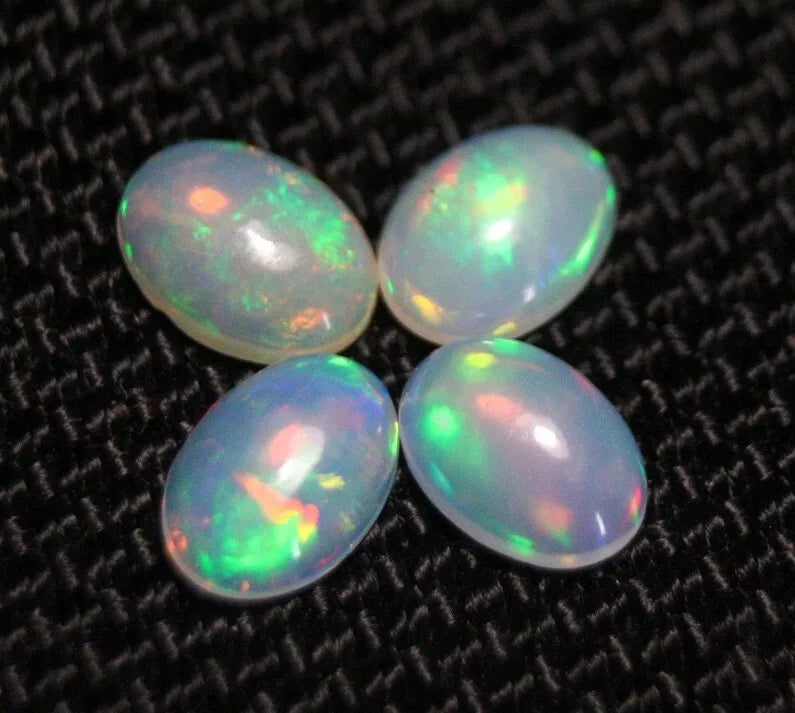 Welo Opal Cabochon Rainbow Flash 7x5mm 4pc Lot 1.76ct Natural Opal Ethiopia