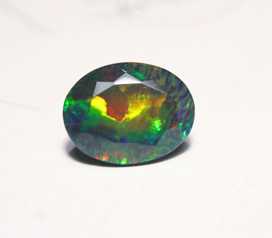 Faceted Black Welo Opal 6.9ct Floral Honeycomb Blaze AAA Ethiopian Opal 15x12mm