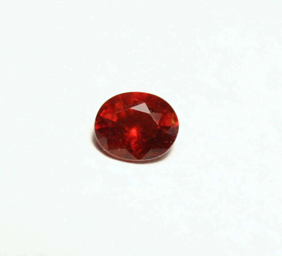 Clinohumite 0.51ct Ultra Rare Deep Orange / Red Faceted Gem - Pakistan 5x4.2mm