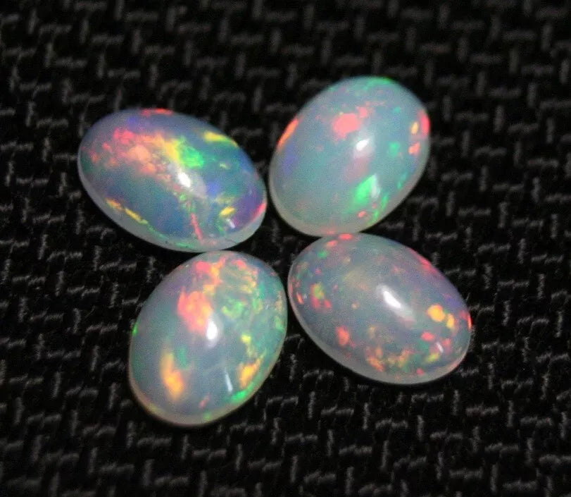 Welo Opal Cabochon Rainbow Flash 7x5mm 4pc Lot 1.72ct Natural Opal Ethiopia