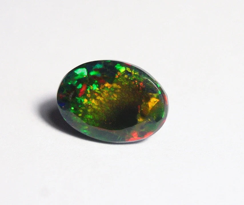 Faceted Black Welo Opal 5.24ct Rainbow Confetti AAA Natural Ethiopian Opal 13x9mm