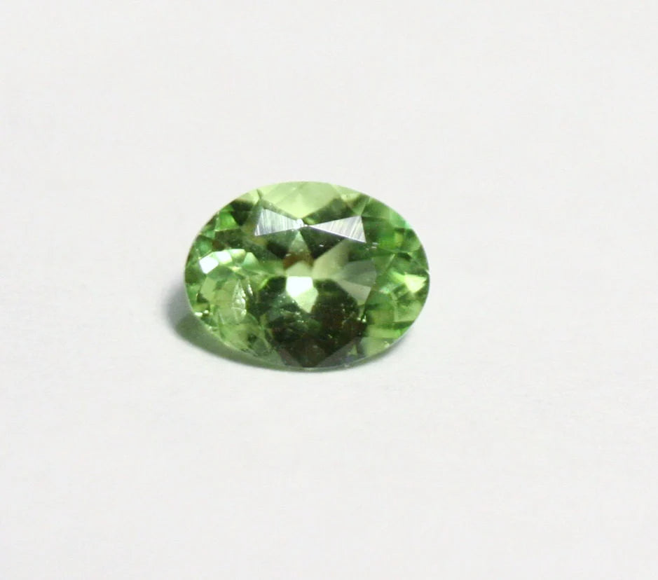 Merelani Mint Grossular Garnet 0.47ct Rare Vivid Green Faceted Fluorescent Gem 6x4mm