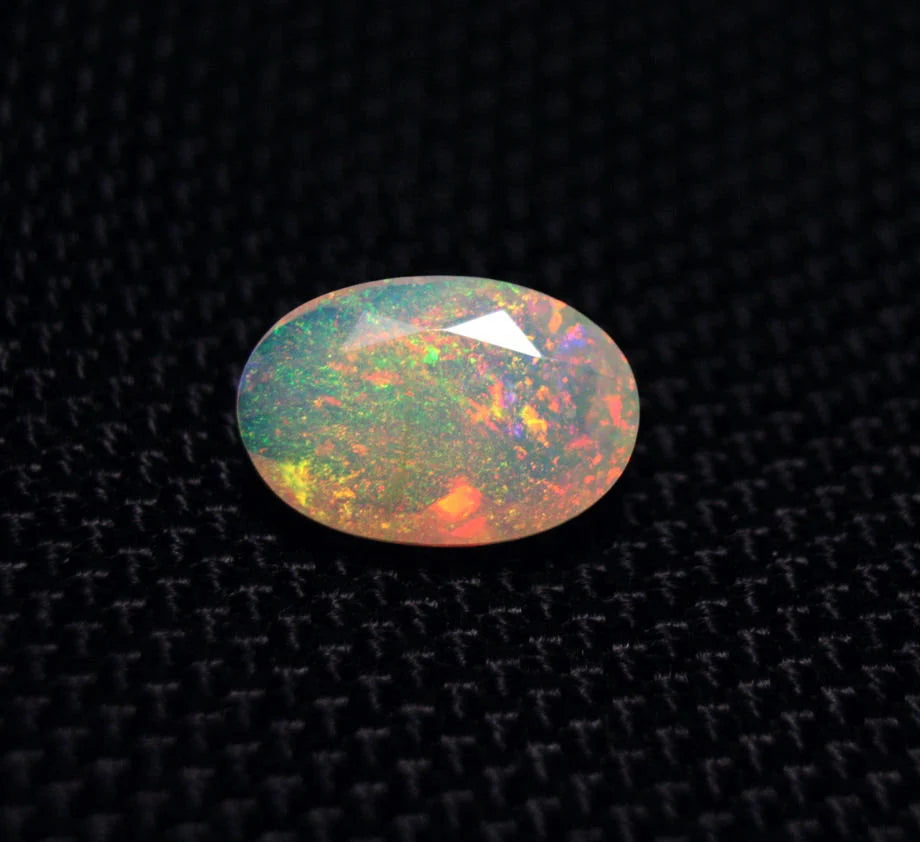 Faceted Welo Opal 2.2ct Rainbow Confetti Blaze Natural Ethiopian Opal 12x8mm Video AAA