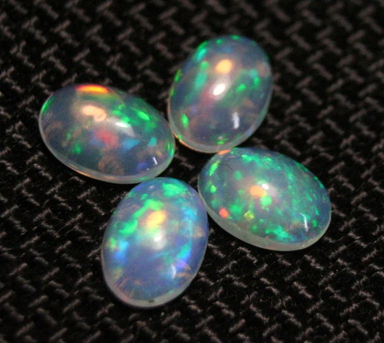 Welo Opal Cabochon 7x5mm 4pc Lot 1.74ct Lot Rainbow Ovals AAA Crystal Opal