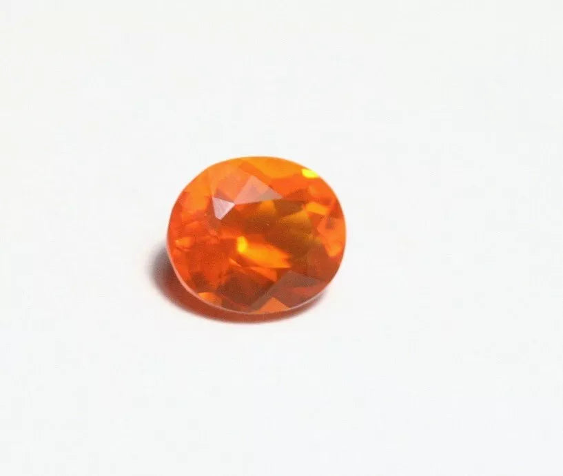 Faceted Orange Mexican Fire Opal 0.7ct Oval Cut Natural Opalescent 7x5mm