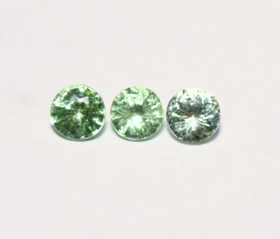 Merelani Mint Grossular Garnet 3pc lot 0.7ct Rare Faceted Fluorescent Exceptional Gem Lot 3.5mm