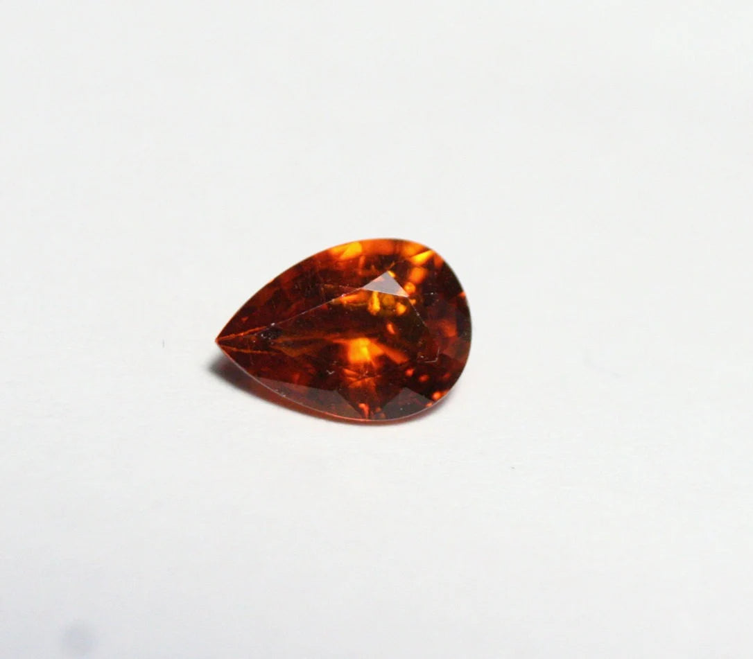 Clinohumite 0.7ct Ultra Rare Orange / Red Faceted Gem Pakistan 7x5mm