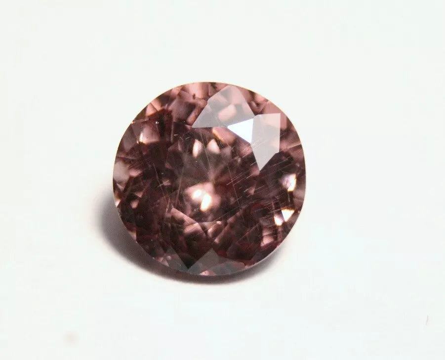 Colour Change Garnet 1.5ct Round Cut Gem with Rare Colour Change Tanzania 6x6mm