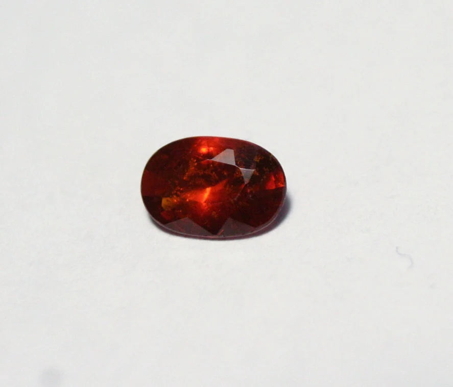 Clinohumite 0.56ct Ultra Rare Deep Orange / Red Faceted Gem - Pakistan 6x4mm