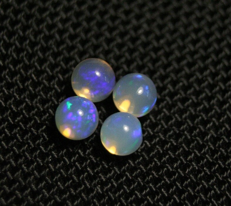 Welo Opal Crystal Ball 4pc Lot 2.6ct Neon Spheres Natural Ethiopian Opal 5x5mm