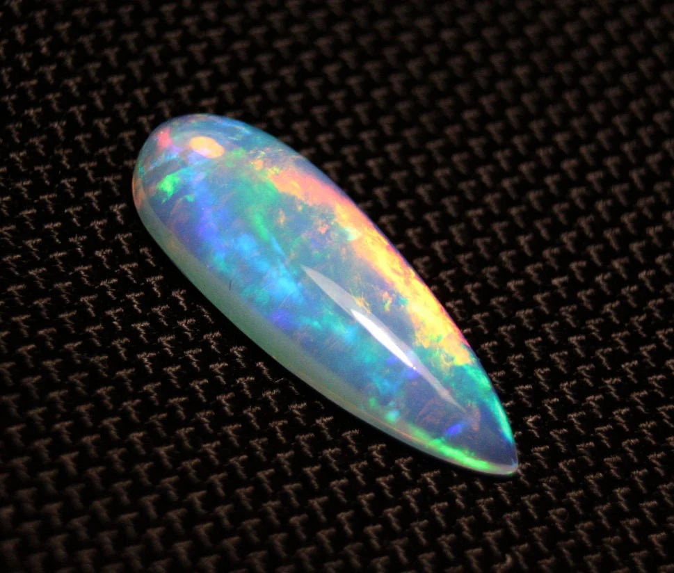 Welo Crystal Opal Cabochon 7.7ct Neon Teardrop Natural Opal See Video 28x10mm