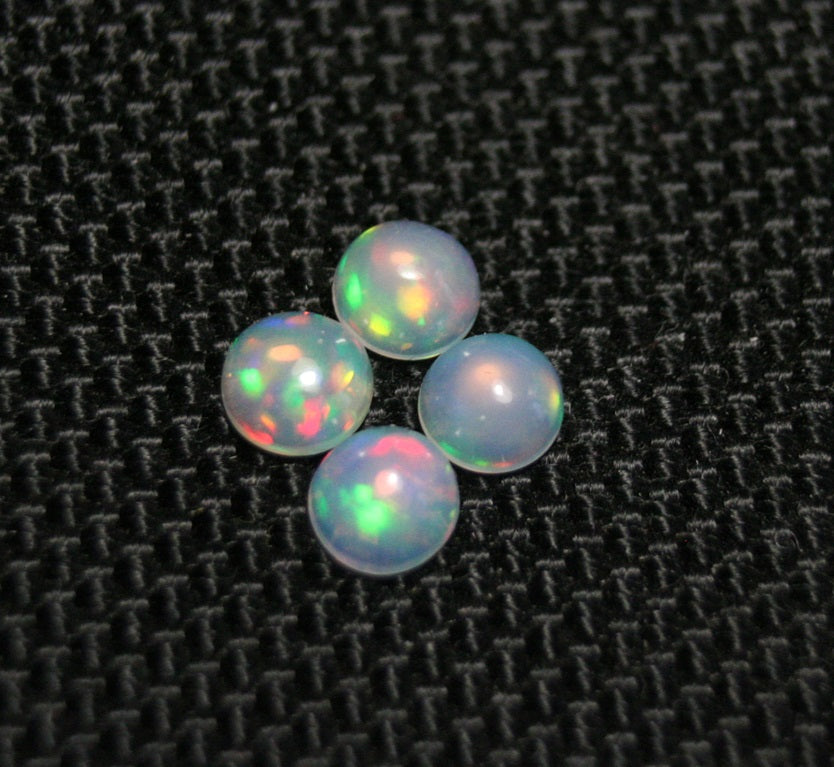 Welo Crystal Opal Round 5x5mm Cabochons 4pc Lot 1.19ct AAA Jelly Opal