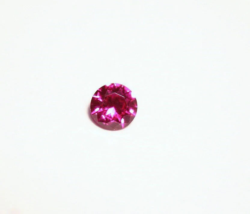 Lab Created Ruby 5x5mm Precision Cut Brilliant Round AAA - Swiss Origin