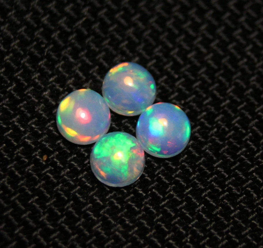 Welo Crystal Opal Round 5x5mm Rainbow Cabochons 4pc Lot 1.35ct AAA Jelly Opal